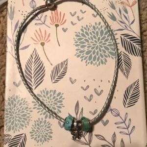 Pandora bracelet with three charms